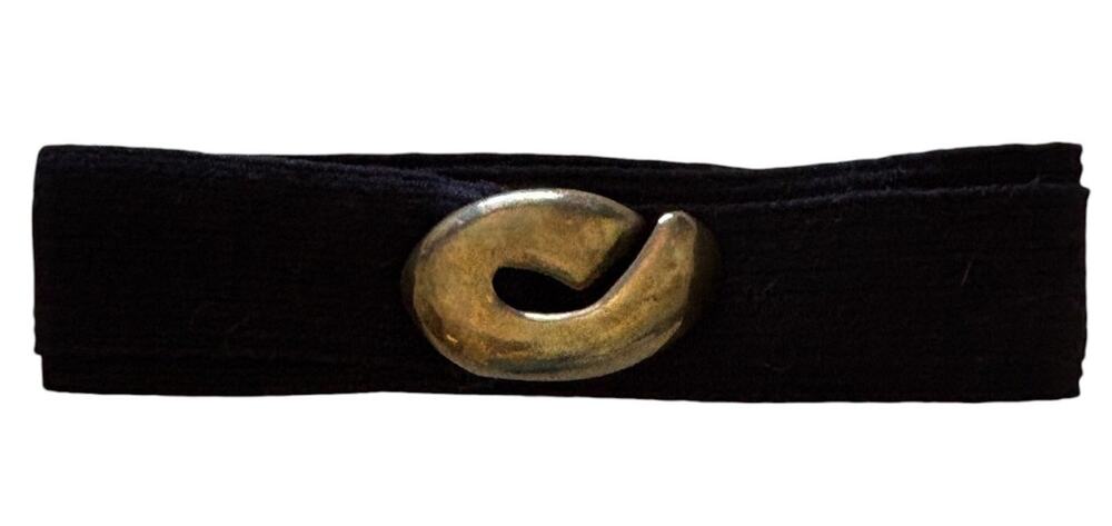 Black elastic adjustable belt sculptural brass swirling loop design vintage